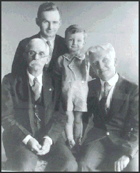 Photo of Elmore, Everett,  
Everett, Jr., and Charles